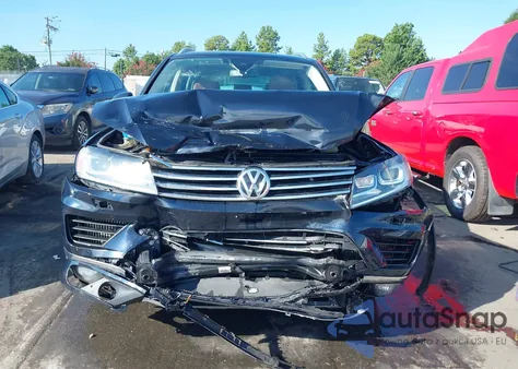 2015 Volkswagen Touareg Tdi Lux z USA, uszkodzony, nr VIN WVGEP9BP5FD006664